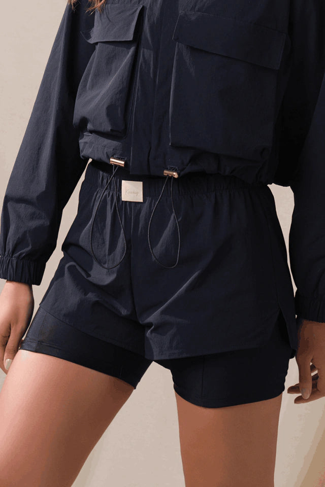 Eleganz Runner Shorts - Schwarz